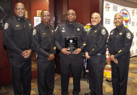 Orange County Corrections Officer Timothy Williams of Kissimmee, pictured with his Corrections brethren, was honored last week for his efforts to help thwart a 2023 potential kidnapping. PHOTO/ORANGE COUNTY CORRECTIONS