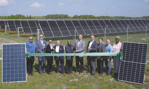 Orlando Utilities Commission leaders and corporate partners gathered Thursday announce the opening of its largest solar energy center thus far on Nova Road. PHOTO/OUC