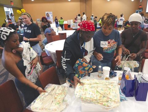 New mothers gathered resources and supplies at the stations during the 2025 Heart of Florida United Way Community Baby Showers last week. (Photo/HFUW)