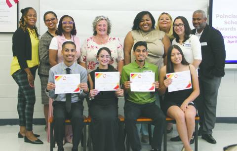 The Poinciana Council honored the 2025 Poinciana Council Scholarship recipients seated from left, Bryan Ramjattan (Valencia College), Paulina Diaz (Poinciana High School), Ethan Ortiz Valencia (Osceola High School), and Isabela Lopez-Vayas (Gateway High School). (Photo/Michelle Kostuch)