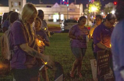 Thursday’s domestic violence event will conclude with a candlelight vigil at the Kissimmee Police Department. FILE PHOTO