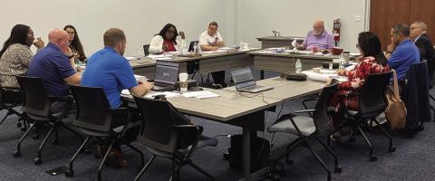 Kissimmee city commissioners and senior city staff work through a strategic goalsetting process with facilitator Lyle Sumek last week in the new Development Service Center expansion of City Hall. PHOTO/TERRY LLOYD