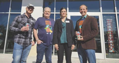 Citrus Kiss is the brainchild of Celebration Brewing Company’s Frank Lozito (left, with Experience Kissimmee CEO D.T. Minich, Health Start of Osceola County Executive Director Kerri Stephen and Experience Kissimmee Chief of Destination Stewardship Jason Holic), as proceeds from its sale will go to help new parents in Osceola County. PHOTOS/KEN JACKSON