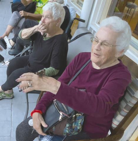 PHOTOS/GOOD SAMARITAN VILLAGE A butterfly finds a nice spot on Mary Lou Amerman’s hand at a Nov. 27 event at Good Samaritan Village’s butterfly garden that honored its founders and celebrated its 25th year.