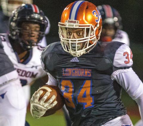 Tyler Emans rushed for 203 yards and scored three touchdowns as the Harmony Longhorns came from 14 points down to defeat Mt. Dora, 35-34, last week. PHOTO/ROB HERBERT