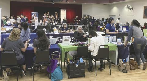Osceola County staff members conduct a door prize drawing during the Community District 5 Resource Network Event at the St. Cloud Community Center on March 4. PHOTO/TERRY LLOYD