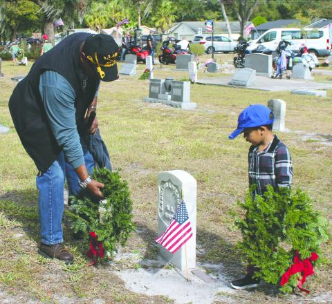 Veterans showed the next generation the Wreaths Across America’s goal to Remember, Honor, Teach. PHOTO/TERRY LLOYD