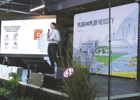 Katy Jinkins, PhD, CEO and Co-founder of SixLine Semiconductor, explains how carbon nanotubes will be used in next-gen electronics at a Plug And Plug-hosted NeoCity expo Oct. 24. PHOTO/TERRY LLOYD