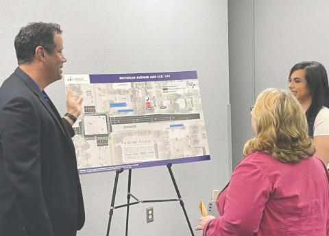 Osceola County transportation designers exhibit the Michigan Avenue safety enhancement project plans to the public at a town hall March 25 at the Kissimmee Civic Center. PHOTO/OSCEOLA COUNTY