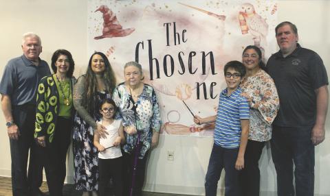 Jasper, Chris and Sim Stafford (at right), along with more of their extended family, celebrated becoming an official family at the Osceola County Courthouse Friday during a Florida Adoption Month celebration. PHOTO/KEN JACKSON
