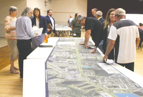 Local residents get the big picture on plans to widen Canoe Creek Road south of U.S. Highway 192. PHOTO/TERRY LLOYD