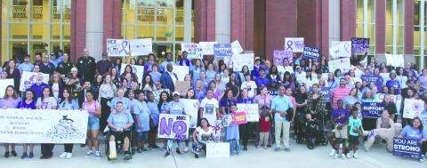 Strength in numbers — hundreds turned out for Help Now’s annual Awareness Walk and Candlelight Vigil last Thursday, to raise up domestic violence survivors and remember its victims. PHOTOS/KEN JACKSON