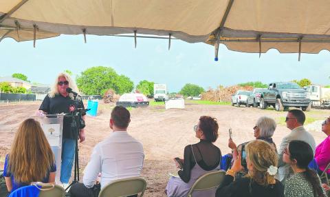 Osceola Council on Aging CEO Wendy Ford speaks at the “official” ground breaking of Buen Vecino Friday. (Photo/Ken Jackson)