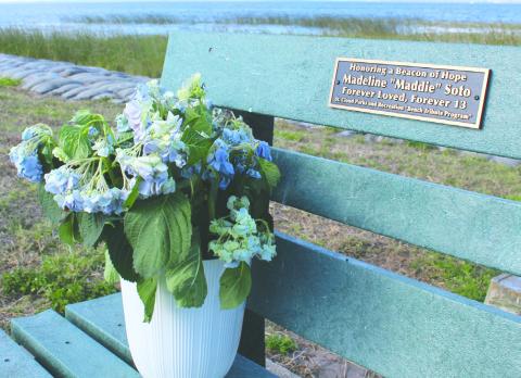 Supporters dedicated a St. Cloud Lakefront Park bench, overlooking a peaceful spot on East Lake Toho, to the memory of slain 13-year-old Madeline Soto. (Photos/Ken Jackson)