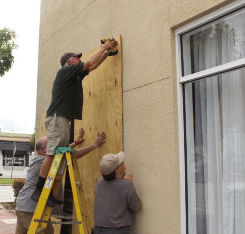 Downtown Kissimmee businesses—and the Kissimmee Police Department—prepped properly to protect property by Tuesday, the last “business as usual” day before Hurricane Milton was set to arrive. PHOTO/KEN JACKSON