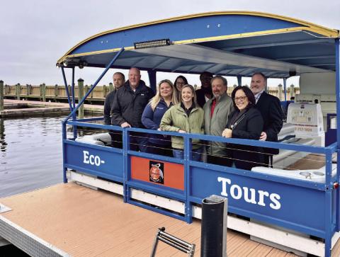 Chris and Yvette Passmore’s Florida Everglades Eco-Toon Tour boat offers eco-tours of Lake Toho and Shingle Creek. The city held a ribbon cutting Thursday. PHOTO/DEBBIE DANIEL