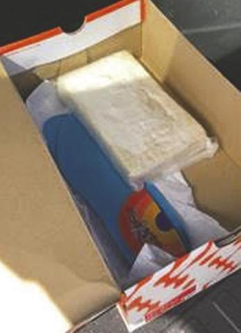 When law enforcement stopped his vehicle, Carlos Garcia-Garcia was found to be carrying the shoebox containing a kilogram of cocaine. PHOTO/DEPT. OF JUSTICE