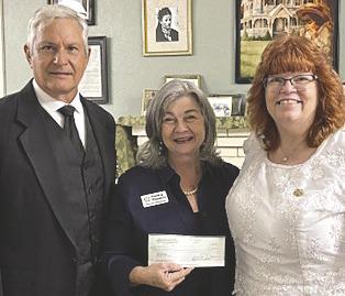 Tammi Madison of Pantry Planters, with Carl Hargrove, Past Grand Patron of Florida, and Debbie Rosenthal,Worthy Grand Matron, received a $30,000 donation from the Grand Chapter of Florida Order of the Eastern Star to fund more school pantries. SUBMITTED PHOTO