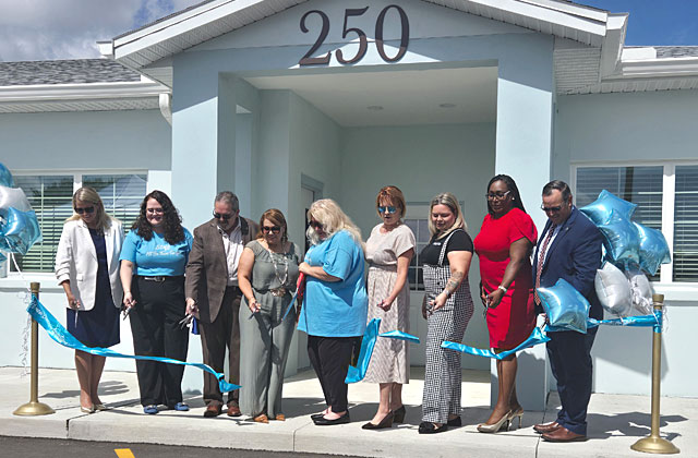 City, County, State and Osceola Council on Aging officials cut the ribbon Friday at the Buen Vecino senior affordable living community in Buenaventura Lakes. (Photo/Ken Jackson)