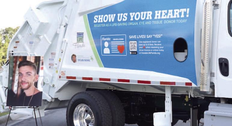 The owners of Celebration Sanitation are honoring its son Dylan Rowe, who died suddenly a year ago but saved other lives as an organ donor. The truck encourages people to sign up as an organ donor. PHOTO/ADVENTHEALTH CELEBRATION