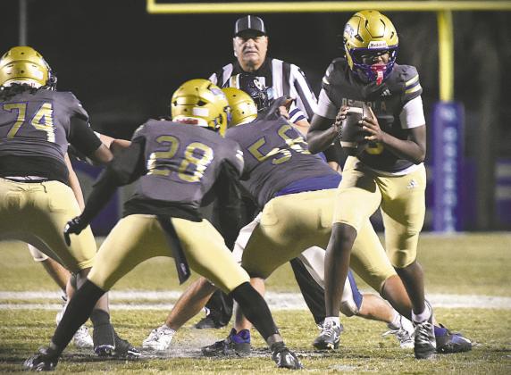 Osceola High will need contributions through the air from senior quarterback Amaree Rutland (with ball) in order to defeat South Lake in the playoffs Friday, Kowboys coaches say. (Photo/Katie Williams)