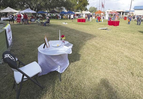 The scene at the inaugural St. Cloud’s Veterans’ Park for Soldier City Sunday, with a POW/MIA table in the foreground. (Photo/Terry Lloyd)
