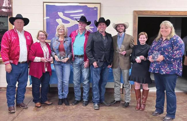 From left, Tom and Martha Booth, Brenda and Mike Wilder and Big Boss Dustin Bronson, Justin Lamb, Trea Lamb and Heather Hobbs, at the Silver Spurs’ Riding Club’s awards ceremony in Kenansville. PHOTO/SILVER SPURS RIDING CLUB