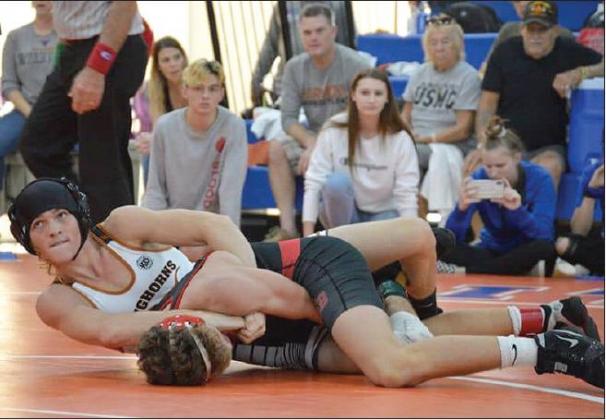 photo courtesy of harmony high school facebook page Over the weekend, the Harmony Longhorns wrestling team captured two third place finishes, two fourth place finishes and four fifth place finishes – scoring team points in 14 different weight classes at Ron Peters Tournament of Champions at Lake Mary High School. The photo above is from the House of Payne tournament in December.