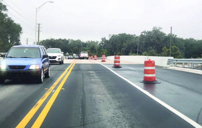 New lanes of the north Simpson Road bridge over Boggy Creek are in use, and two new lanes are coming close to fruition. PHOTO/KEN JACKSON