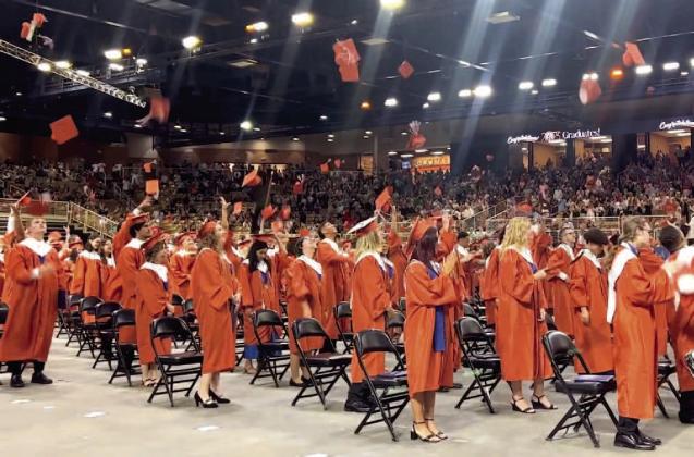 Harmony High grads toss their caps in May 2023. The HHS Class of 2024 will have that chance on May 22, 2024 at the Silver Spurs Arena. FILE PHOTO