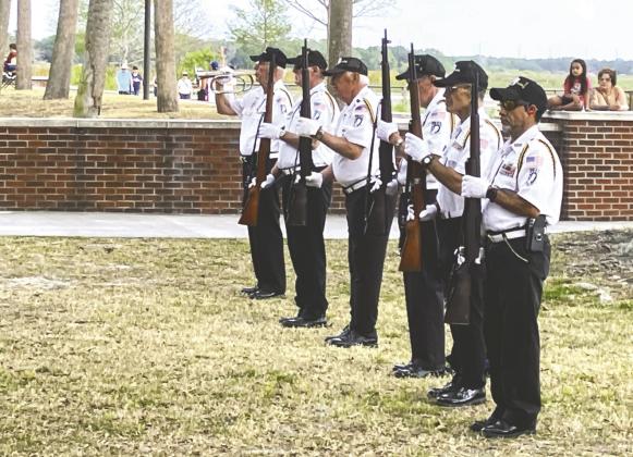 At the Osceola County war memorial, collocated with American Legion Post 10, “Taps” was performed by the Osceola County Veterans Council Honor Guard after firing a 21-gun salute. PHOTOS/TERRY LLOYD