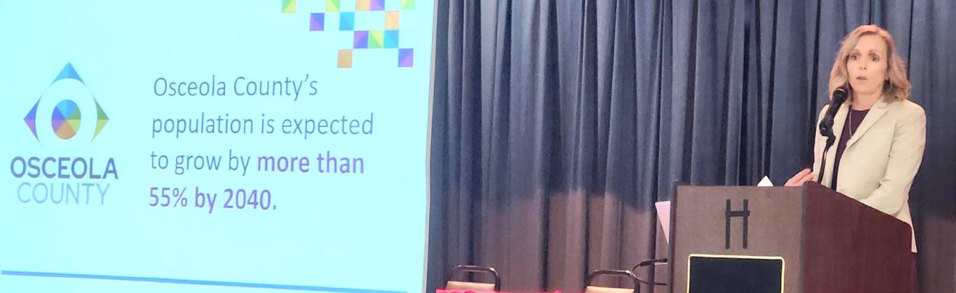 Tawny Olore, the Executive Director of Osceola’s Transportation and Transit Department, gave sobering news for the county’s infrastructure in the future at a summit of local transit leaders last week in St. Cloud. PHOTO/KEN JACKSON