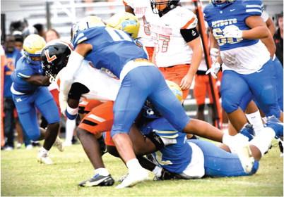 Osceola linebacker Jalen Bell takes down a Lakeland ball carrier in Friday’s game. The Kowboys will try for their first win of the season Thursday at home against Rockledge. PHOTO/KATIE WILLIAMS