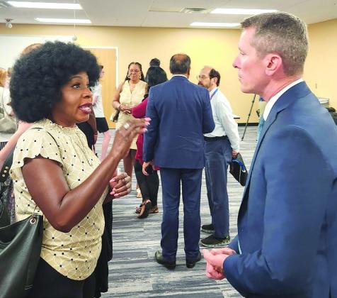 Dr. Michael Allen meets with the public at Monday’s event at Valencia College. PHOTOS/KEN JACKSON