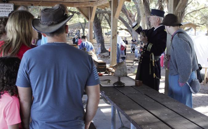 A demonstration of 19th century naval navigation given in the shade at a Chisholm Park pavilion. PHOTO/TERRY LLOYD