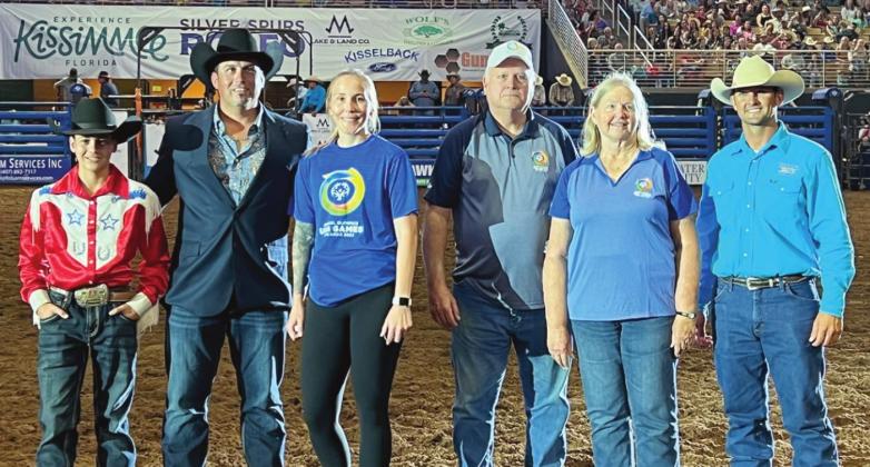 Outcoming and incoming Silver Spurs Rodeo Big Boss Dustin Bronson (second from left) and Clifton Chapman (far right) honored the Special Olympics Team Florida equestrian team. PHOTO/SILVER SPURS RODEO