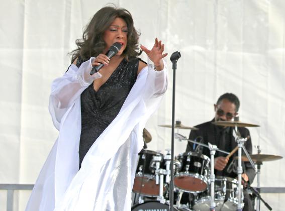 NEWS-GAZETTE PHOTO/NANCY BRIGHAM Mary Wilson, formerly of the famed singing group, The Supremes, performs on stage at Lakefront Park.