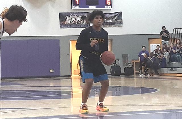 NEWS-GAZETTE PHOTO/J. DANIEL PEARSON Osceola Kowboys point guard Tyrese Carabello gets ready to release a free throw against Celebration. Carabello had three points in Osceola’s 60-48 win over the Storm.
