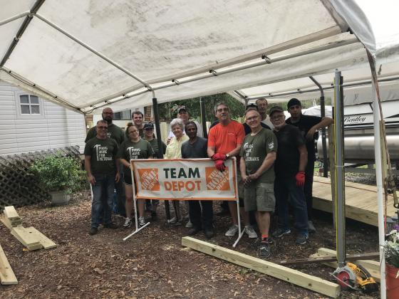 The Osceola Council on Aging and volunteers from The Home Depot in St. Cloud (store No. 6350) built a 41-foot wheelchair ramp for 67-year-old Sgt. Mike Hansell, a U.S. Air Force veteran, and his wife, Carol, in Kissimmee. 