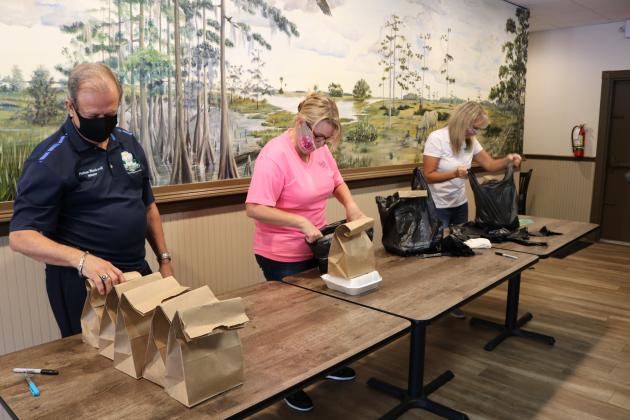 OUC will deliver lunch from Canoe Creek Sports Tavern to Publix employees at the location on Narcoosee Road in St. Cloud on Thursday.