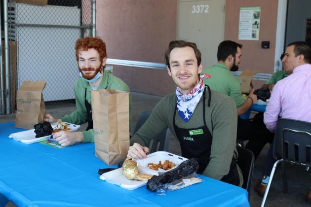 Publix workers enjoy the meal.