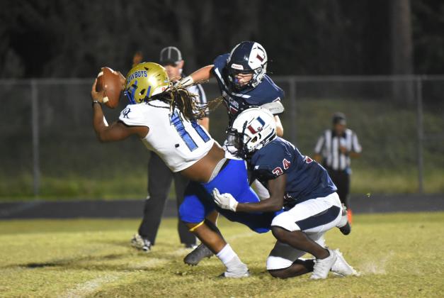 Osceola’s Jamison Jones (11) scores a rushing touchdown during the Kowboys 46-3 playoff win over Palm Harbor University (Photo courtesy of Jana Stultz/Osceola High School).