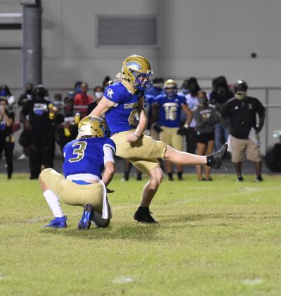 Spencer Richards boots a second quarter 38-yard field goal to cut the Riverview lead to 7-3.  Photo courtesy of Jana Stultz/Osceola High School.