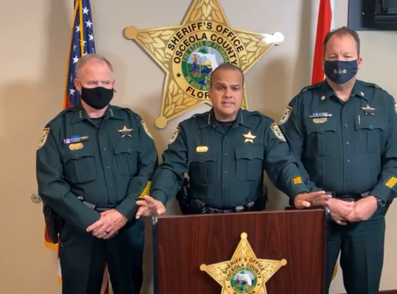 Sheriff Marco Lopez, center, speaks during a media briefing on Friday.