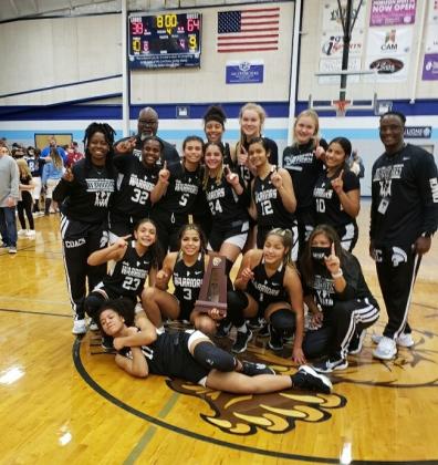 The City of Life Christian Academy Lady Warriors celebrates their Class 2A, Region 3 championship following a 64-38 win over Foundation Academy last Friday night.  Photo courtesy Robert Gorski/City of Life Christian Academy).