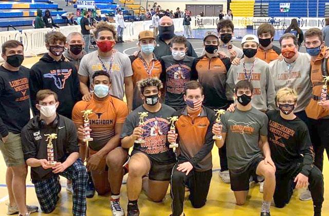 By winning their second consecutive OBC championship, the Harmony wrestling team helped the Longhorns clinch the OBC All-Sports Championship for 2020-21. PHOTO COURTESY HARMONY HIGH SCHOOL