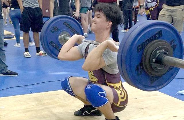 St. Cloud’s Julian Sykes completes a clean and jerk lift at the 2021 OBC Championships in the 155-pound class. Sykes joins Osceola’s Nolin Eady as the Osceola News Gazette’s Co-Lifters of the Year. PHOTO COURTESY ST. CLOUD HIGH SCHOOL