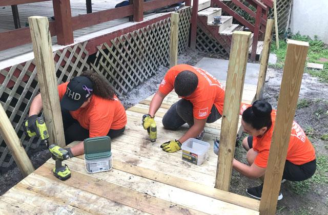 The Osceola Council on Aging teamed up with the St. Cloud Home Depot to build a wheelchair ramp for St. Cloud veteran Johnny Walker and his wife Revena. PHOTO/OSCEOLA COUNCIL ON AGING