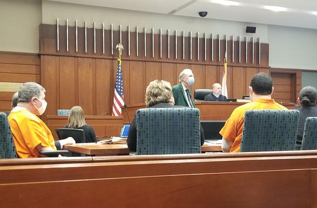 Circuit Court Judge Keith Carsten prepares to sentence Angel Rivera (left) and Christopher Otero-Rivera