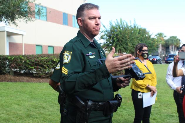 Osceola Sheriff's Sgt. Joel Nicholson shows off the ground scanner used to help locate Project Lifesaver. PHOTO/KEN JACKSON